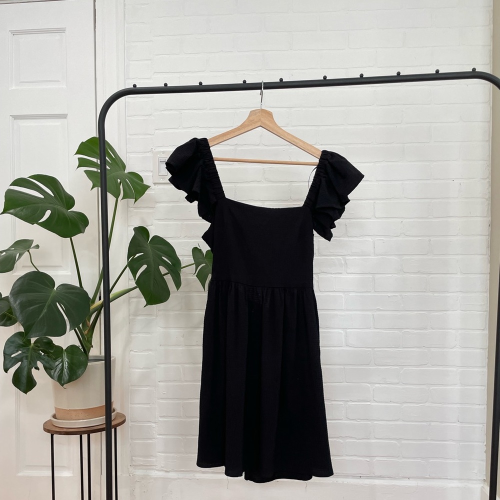 Black cutout dress by Mi Amore